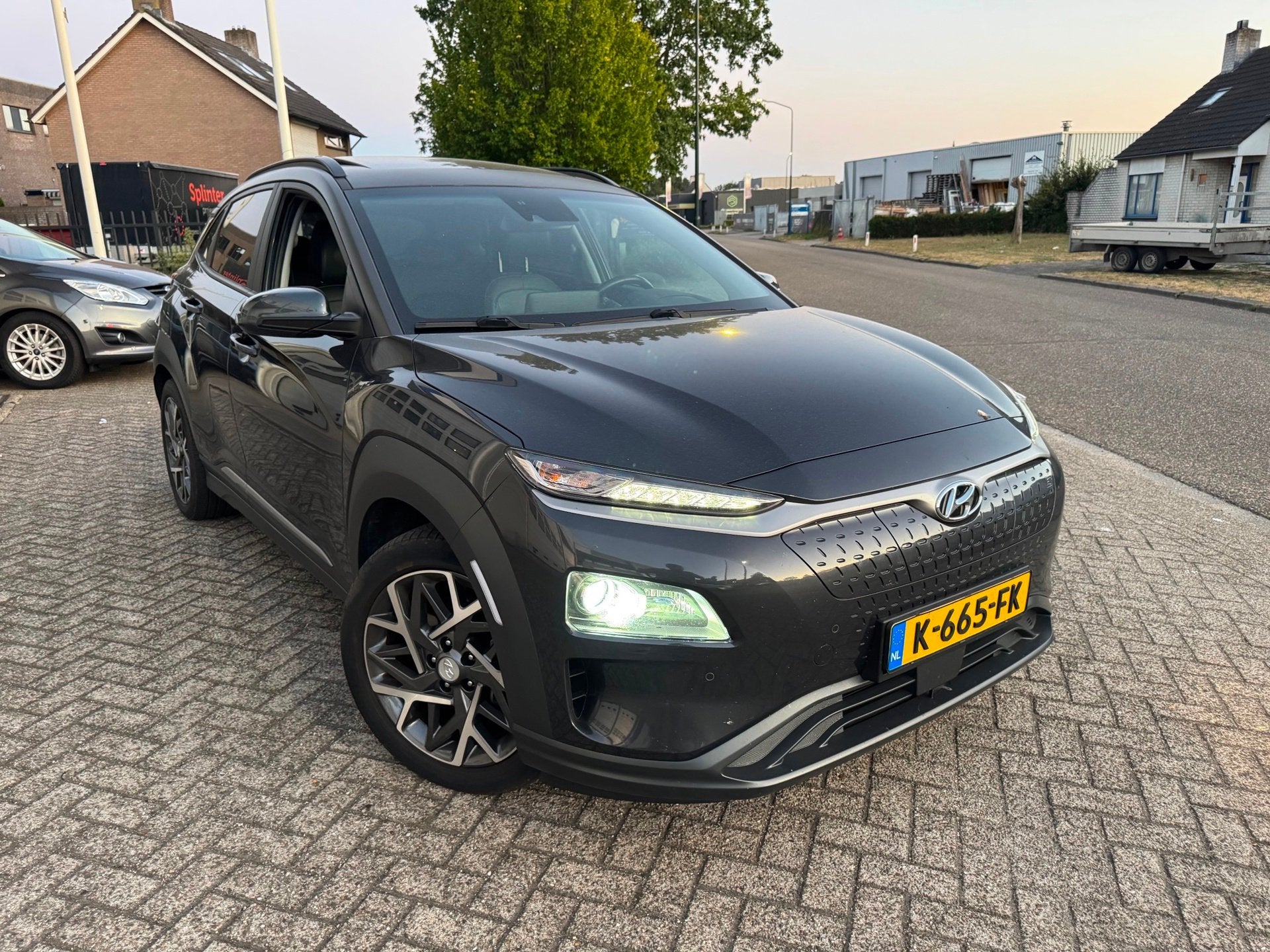 Hyundai Kona EV Premium 64 kWh Leder,Schuifdak,Camera, Auto's, Gebruikt, 174 min, Automatische klimaatregeling, Origineel Nederlands