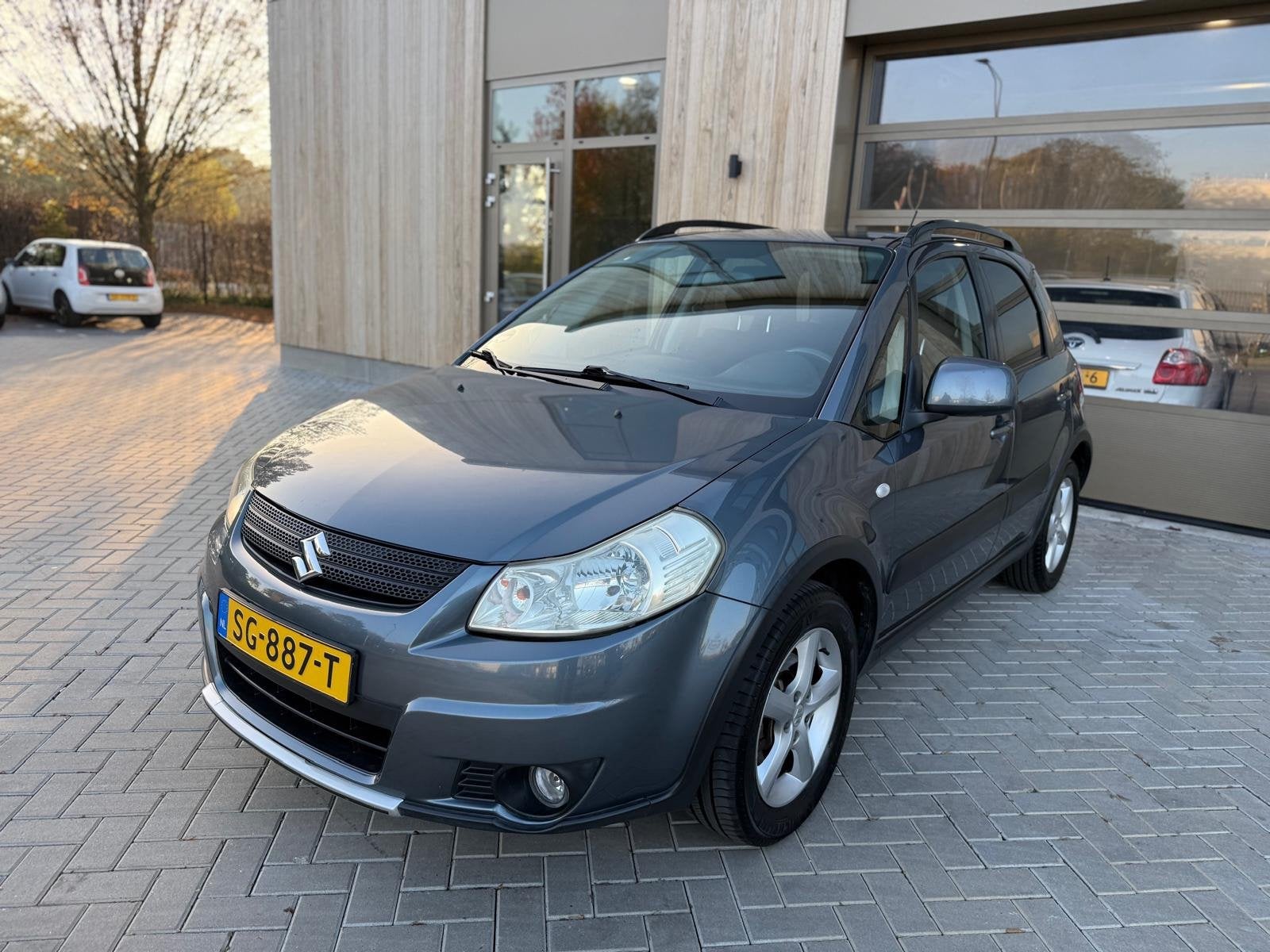 Suzuki SX4 1.6 Comfort 5drs|Airco|Stoelverwarming|Trekhaak|N, Gebruikt, Zwart, 4 cilinders, Handgeschakeld