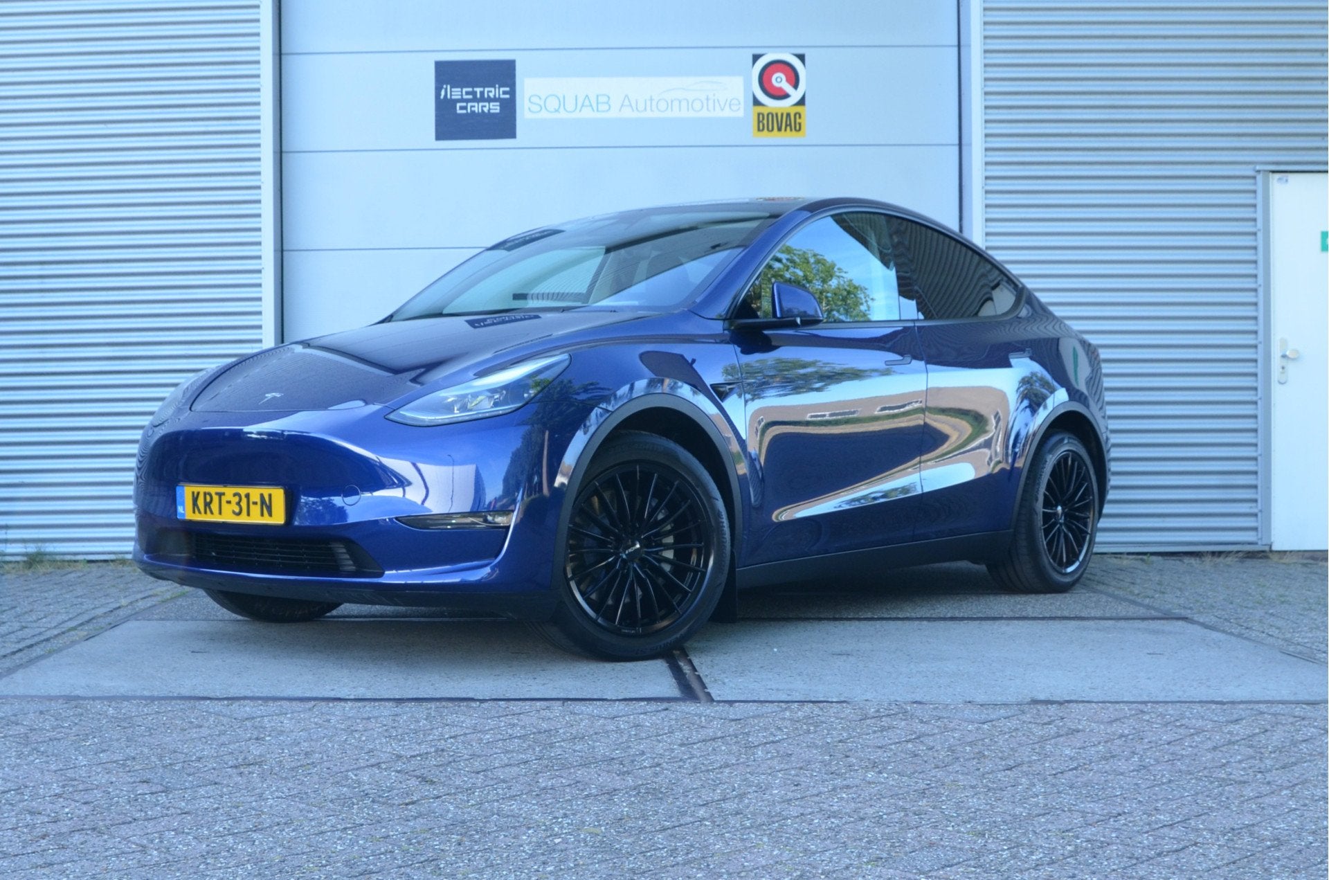Tesla Model Y Long Range AWD 75 kWh Trekhaak (1.600kg) AutoP, Auto's, Tesla, Automaat, 12 maanden, Gebruikt, Blauw