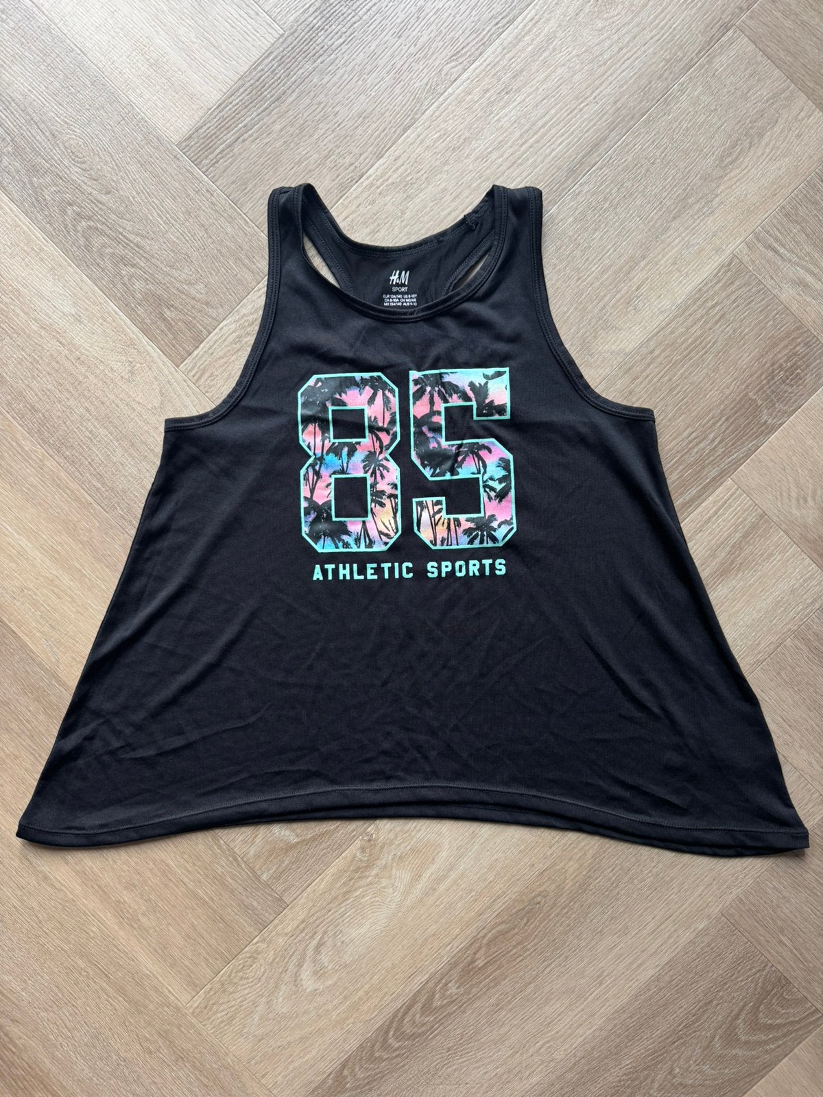 H&M sport zwart mouwloos singlet topje maat 134/140, Ophalen of Verzenden, Zo goed als nieuw, Meisje, Shirt of Longsleeve