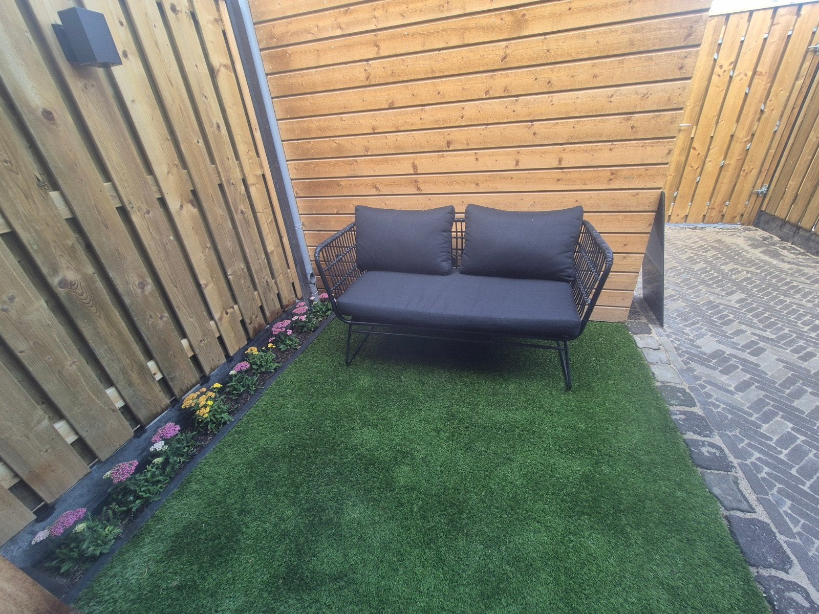 zwart tuinbankje, Tuin en Terras, Ophalen of Verzenden, 2 zitplaatsen