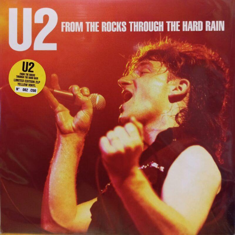 U2 - From the rocks through the hard rain 2lp yellow vinyl, Geseald, Ophalen of Verzenden, Nieuw in verpakking, 12 inch