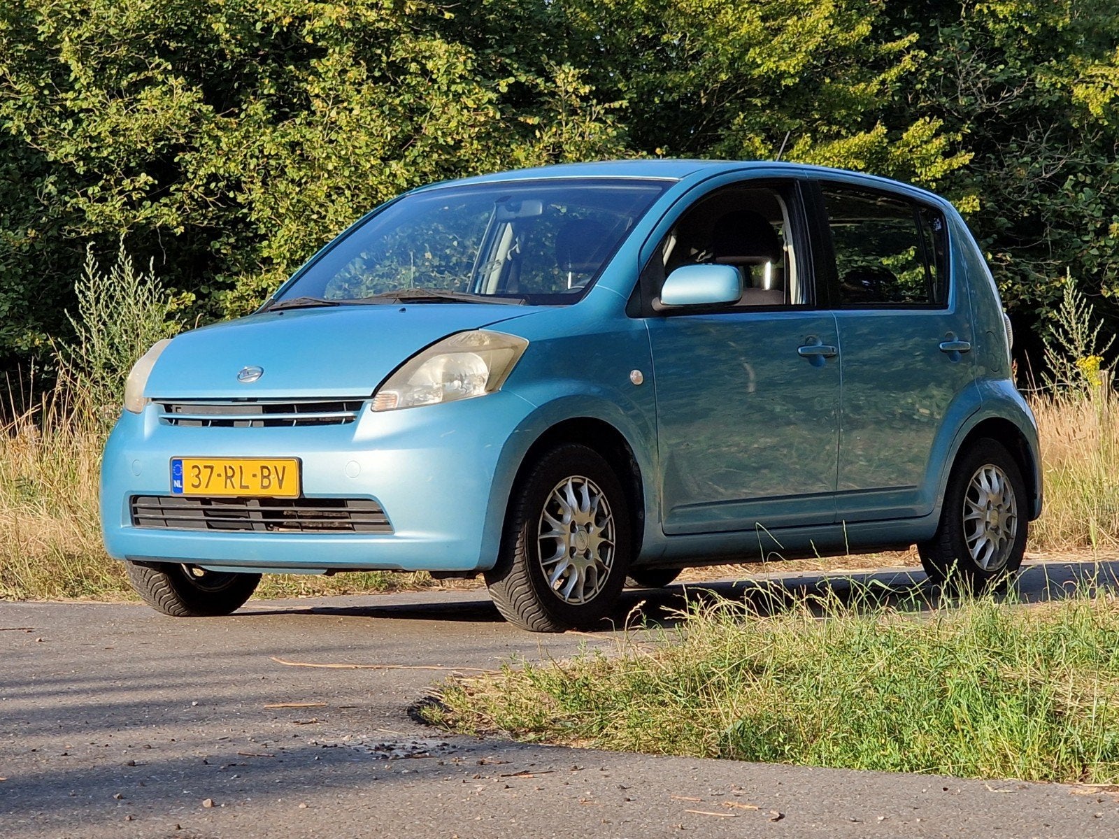 Daihatsu Sirion 1.0 51KW 2005 Blauw, Voorwielaandrijving, Stof, Blauw, Handgeschakeld