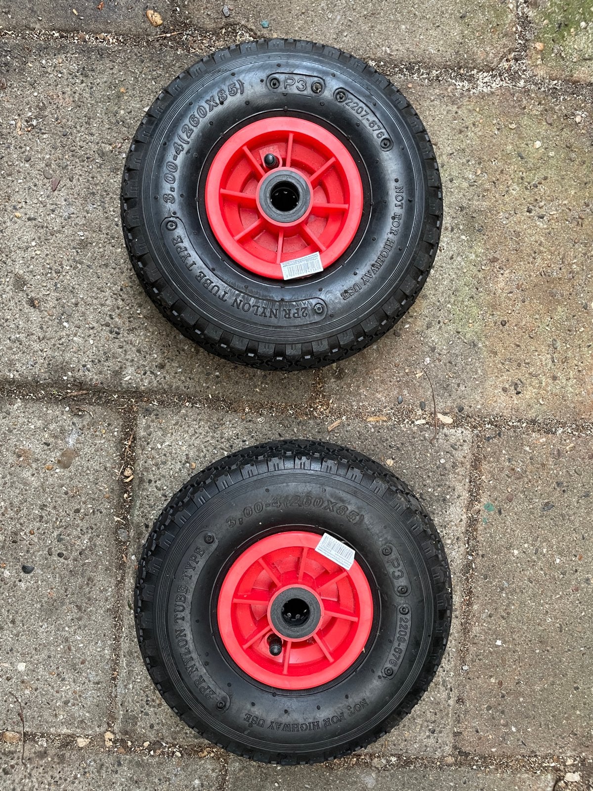 2x Kruiwagenwiel 3.00-4 (260x85) met rode velg, Ophalen of Verzenden, Zo goed als nieuw, Handmatig, Tweewielig