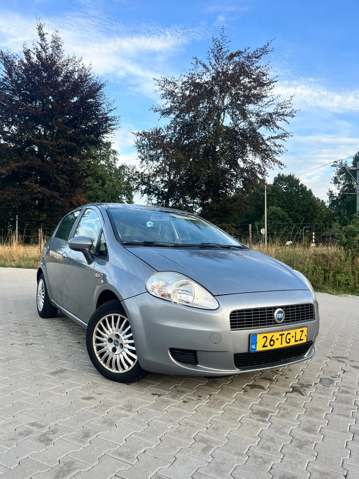 Fiat Grande Punto 1.2 5DR 2006 Grijs, Auto's, 1005 kg, 40 €/maand, 1242 cc, 4 cilinders