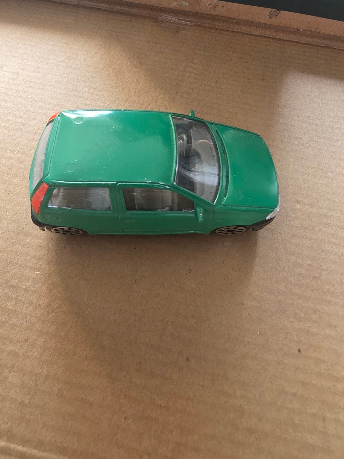 Burago Fiat Punto 1:43 Groen Modelauto Made in Italy, Ophalen of Verzenden, Gebruikt