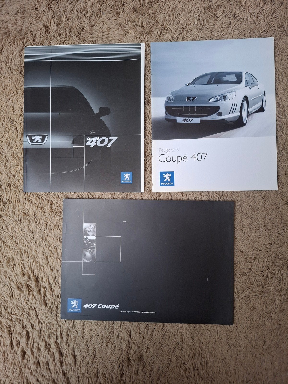 3x autofolder Peugeot 407 coupe, Verzenden, Zo goed als nieuw, Peugeot