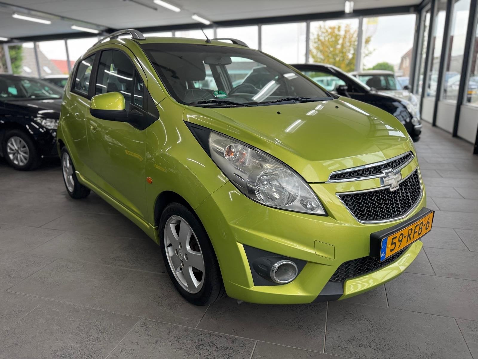 Chevrolet Spark 1.2 16V LT 5-deurs airco elektrische ramen+s, Auto's, Voorwielaandrijving, Stof, Gebruikt, 4 cilinders