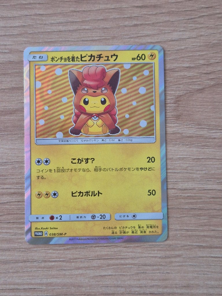 Pikachu Poncho Vulpix Promo kaart Pokémon Kaart 038/SM-P, Verzenden, Zo goed als nieuw, Losse kaart, Foil