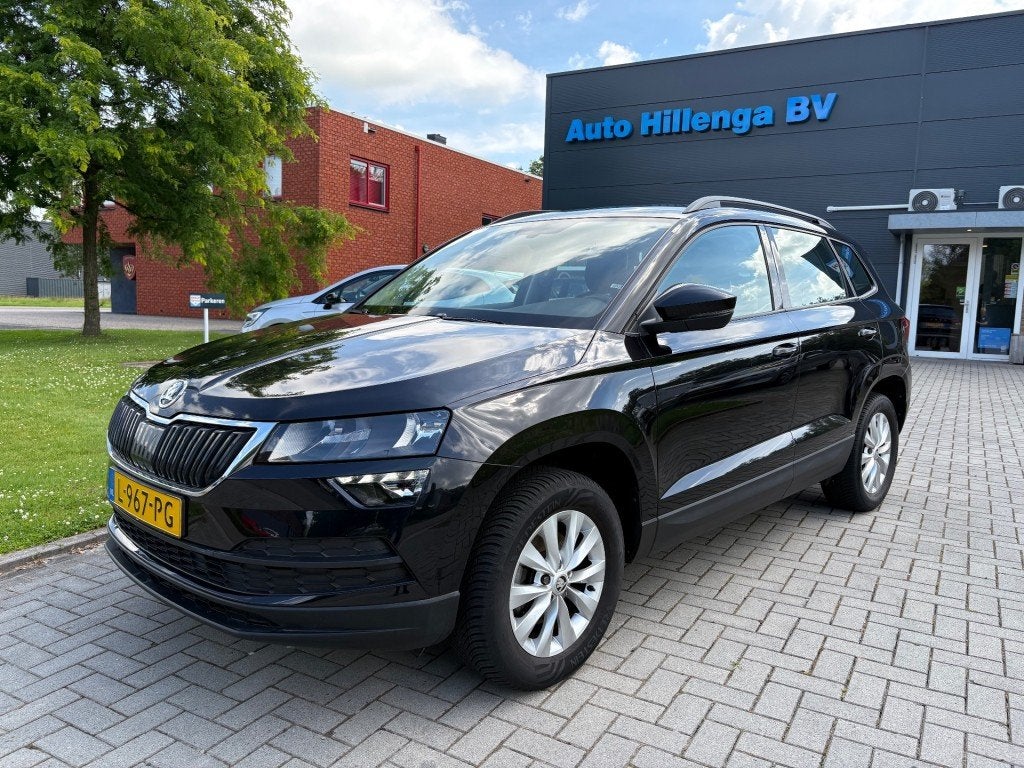 Skoda KAROQ 1.0 TSI BNS.ED. PLUS, Auto's, Gebruikt, Euro 6, Met garantie (alle), Zwart