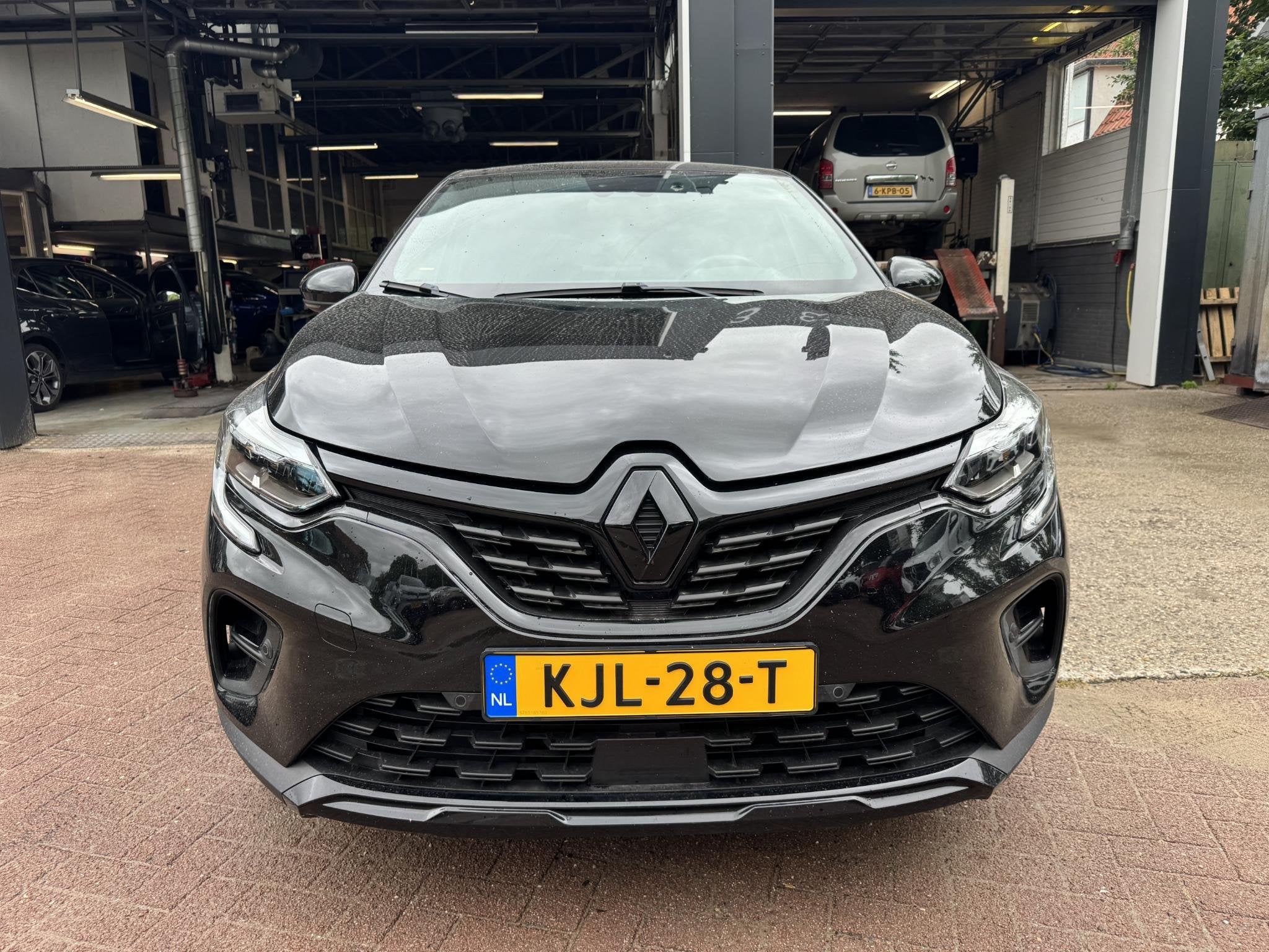 Renault Captur 1.3 TCe 140pk EDC Rive Gauche!, Gebruikt, 4 cilinders, Leder en Stof, Zwart