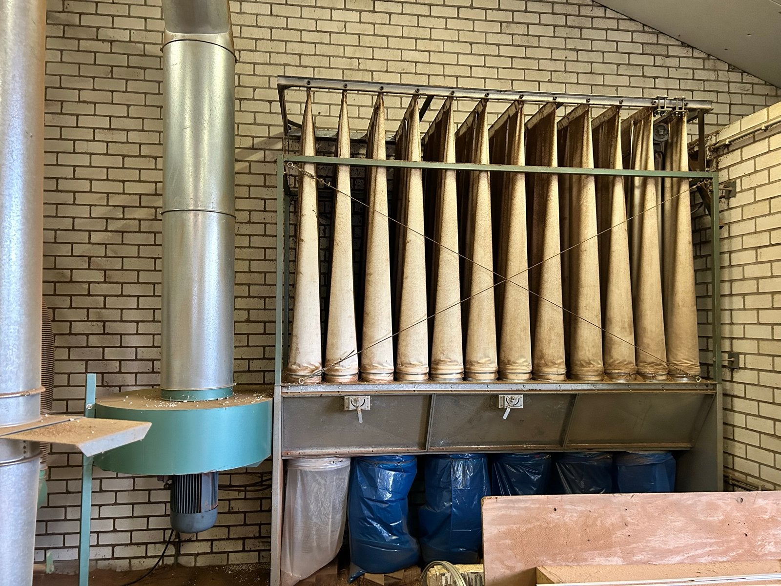 Industriële stofafzuiging met filterinstallatie, Ophalen