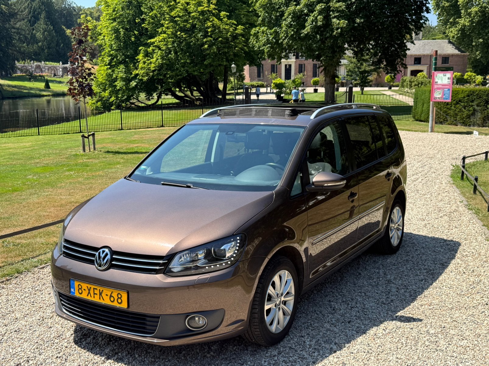 Volkswagen Touran 1.4 TSI 125KW DSG Highline, Auto's, Volkswagen, Euro 5, 15 km/l, Zwart, Bruin