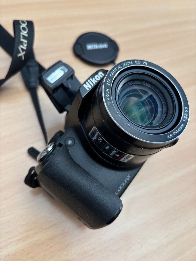 Nikon Coolpix P90 24X superzoom & Filmcamera, 12 megapixels, Ophalen of Verzenden, Nikon, 8 keer of meer