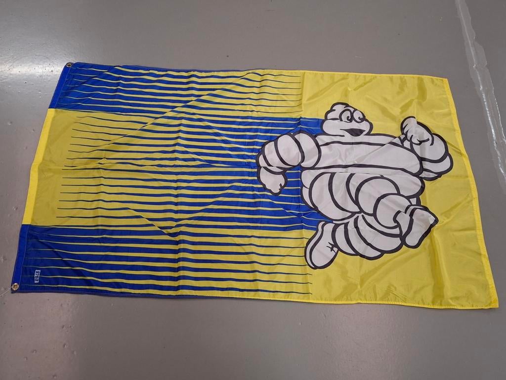 Michelin reclame vlag met Bibendum figuur, Ophalen of Verzenden, Gebruikt, Reclamebord