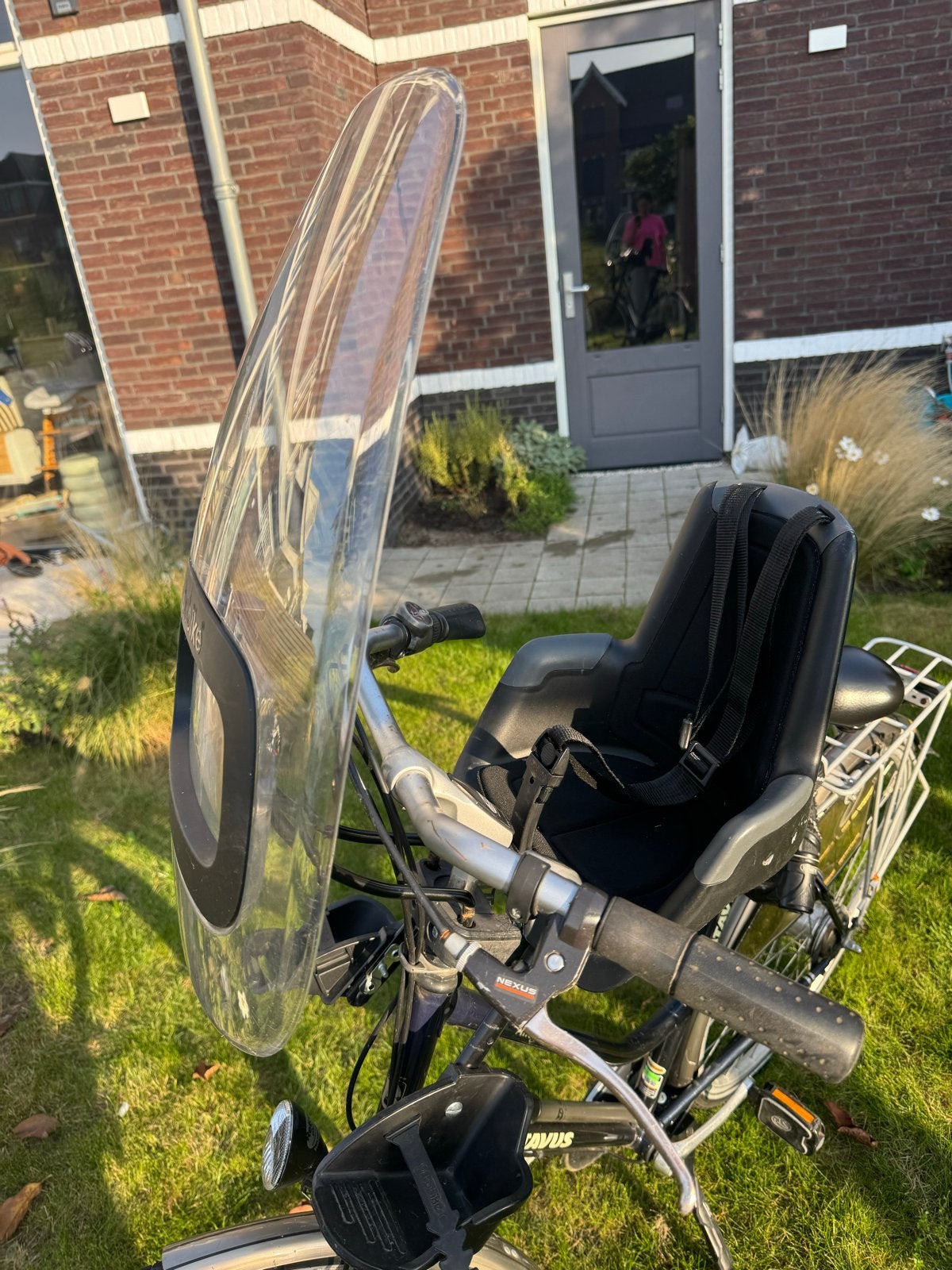 Foto 3 van Batavus fiets met Bobike kinderzitje en windscherm