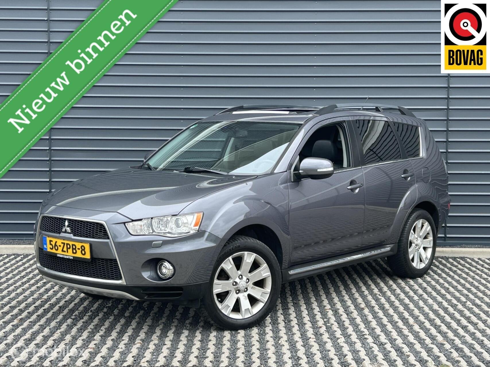 Mitsubishi Outlander 2.0 Edition Two Automaat | Trekhaak, Auto's, Zwart, 4 cilinders, Met garantie (alle), Bedrijf