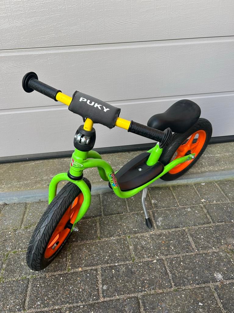 Puky loopfiets groen met oranje wielen, Kinderen en Baby's, Speelgoed | Buiten | Voertuigen en Loopfietsen, Zo goed als nieuw