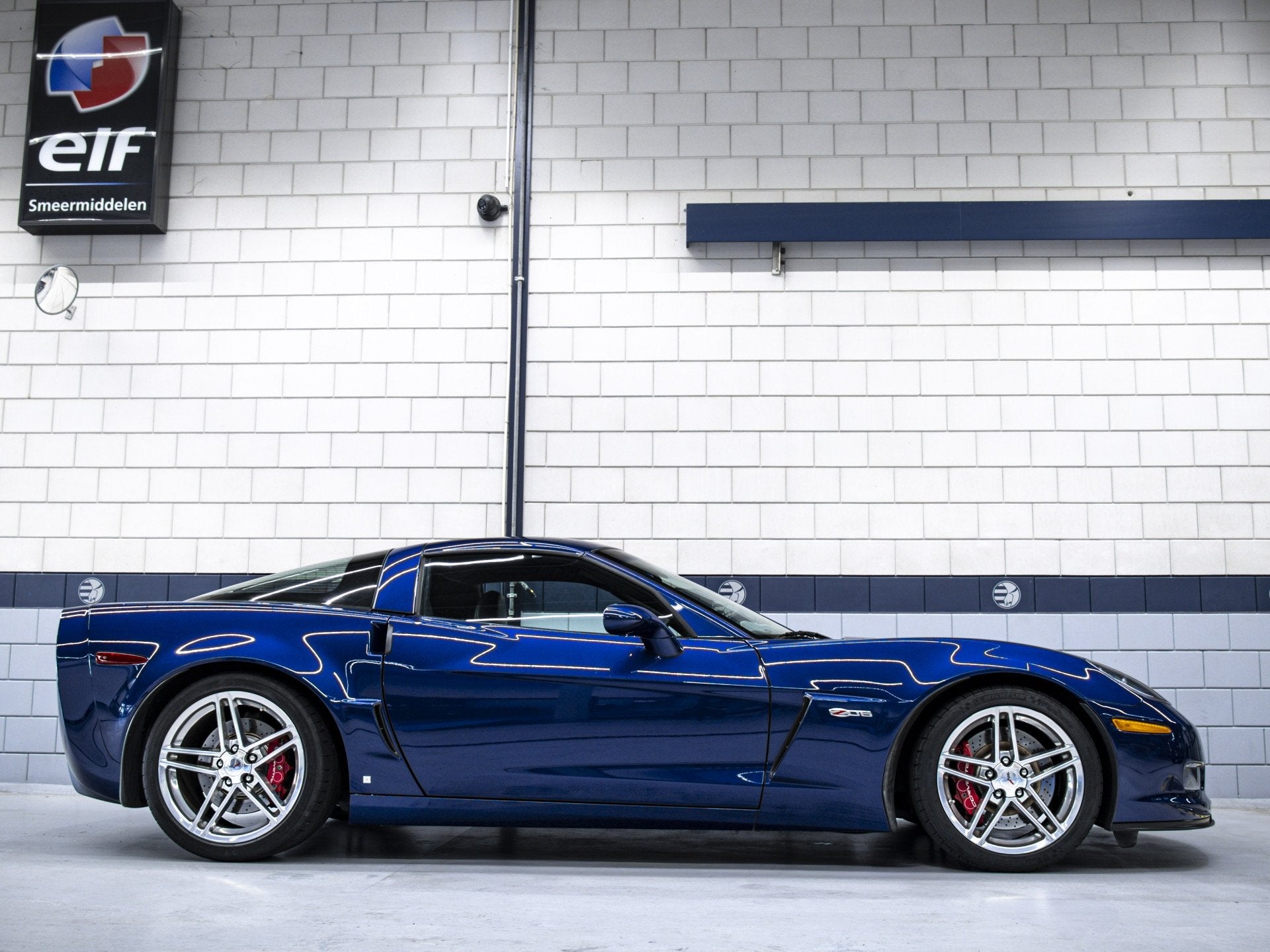 Chevrolet Corvette Z06 7.0L V8 1e Eigenaar in NL (bj 2006), Auto's, Lederen bekleding, Gebruikt, 1350 kg, Blauw