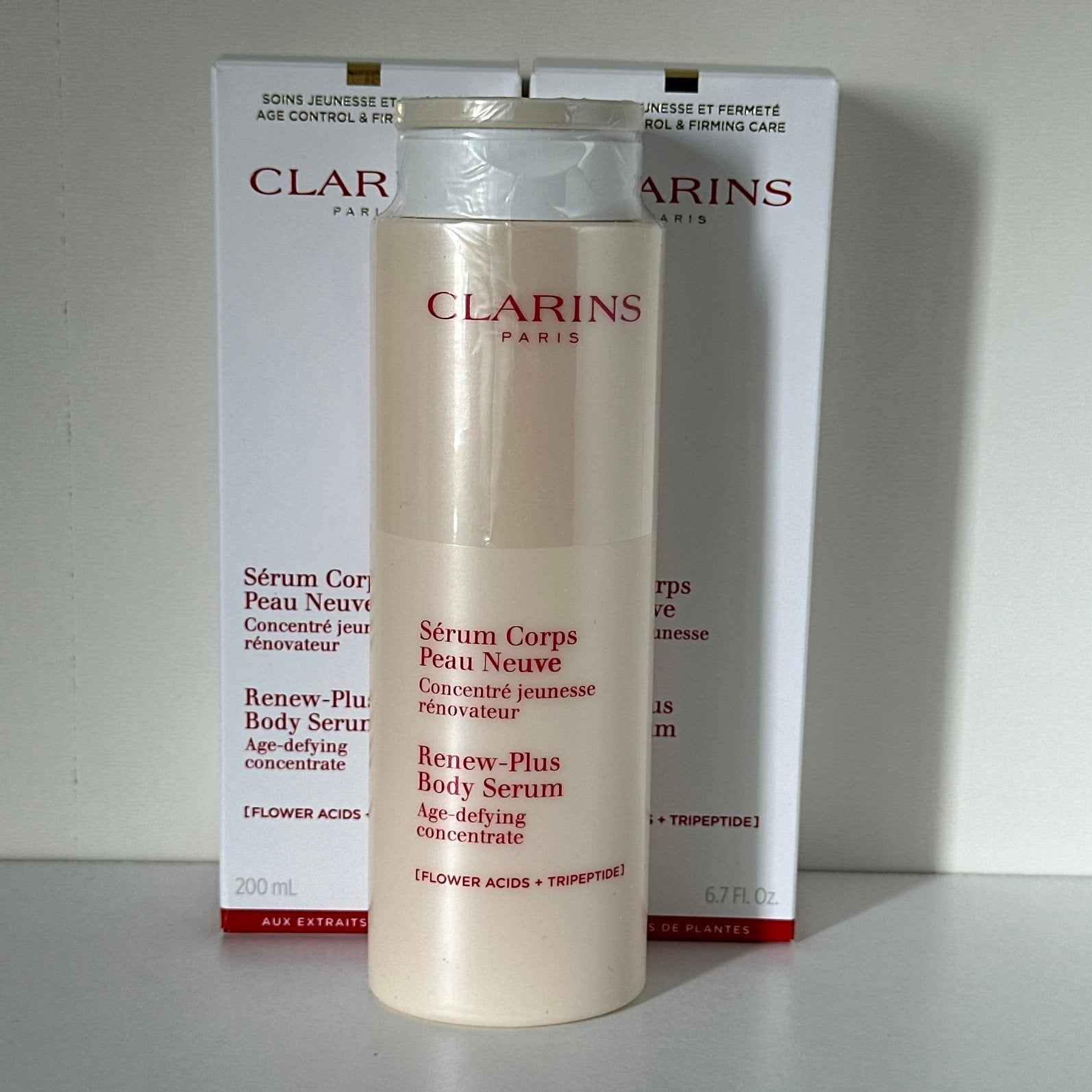 Clarins Renew-Plus Body Serum 200 ml, Ophalen of Verzenden, Nieuw, Bodylotion, Crème of Olie