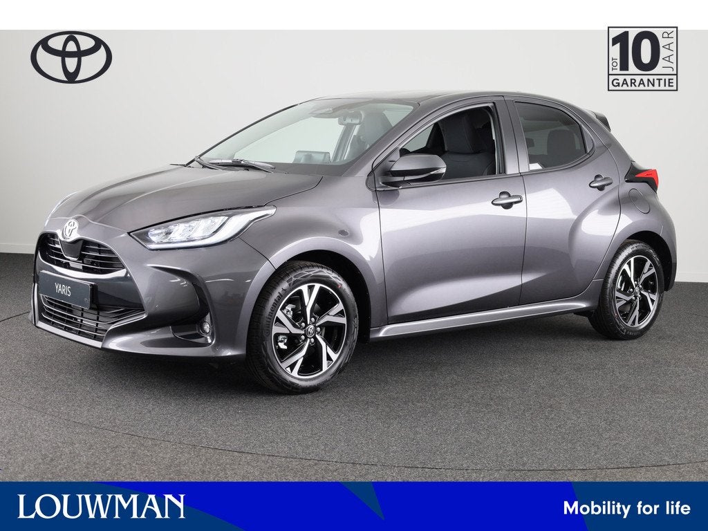 Toyota Yaris Hybrid 115 Dynamic *NIEUW* | DIRECT Leverbaar!, Auto's, Toyota, Stof, Zwart, 116 pk, 1490 cc