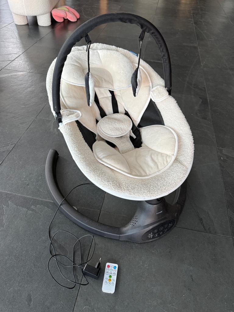 Luvion babyschommel met afstandsbediening, zo goed als NIEUW, Ophalen of Verzenden, Zo goed als nieuw