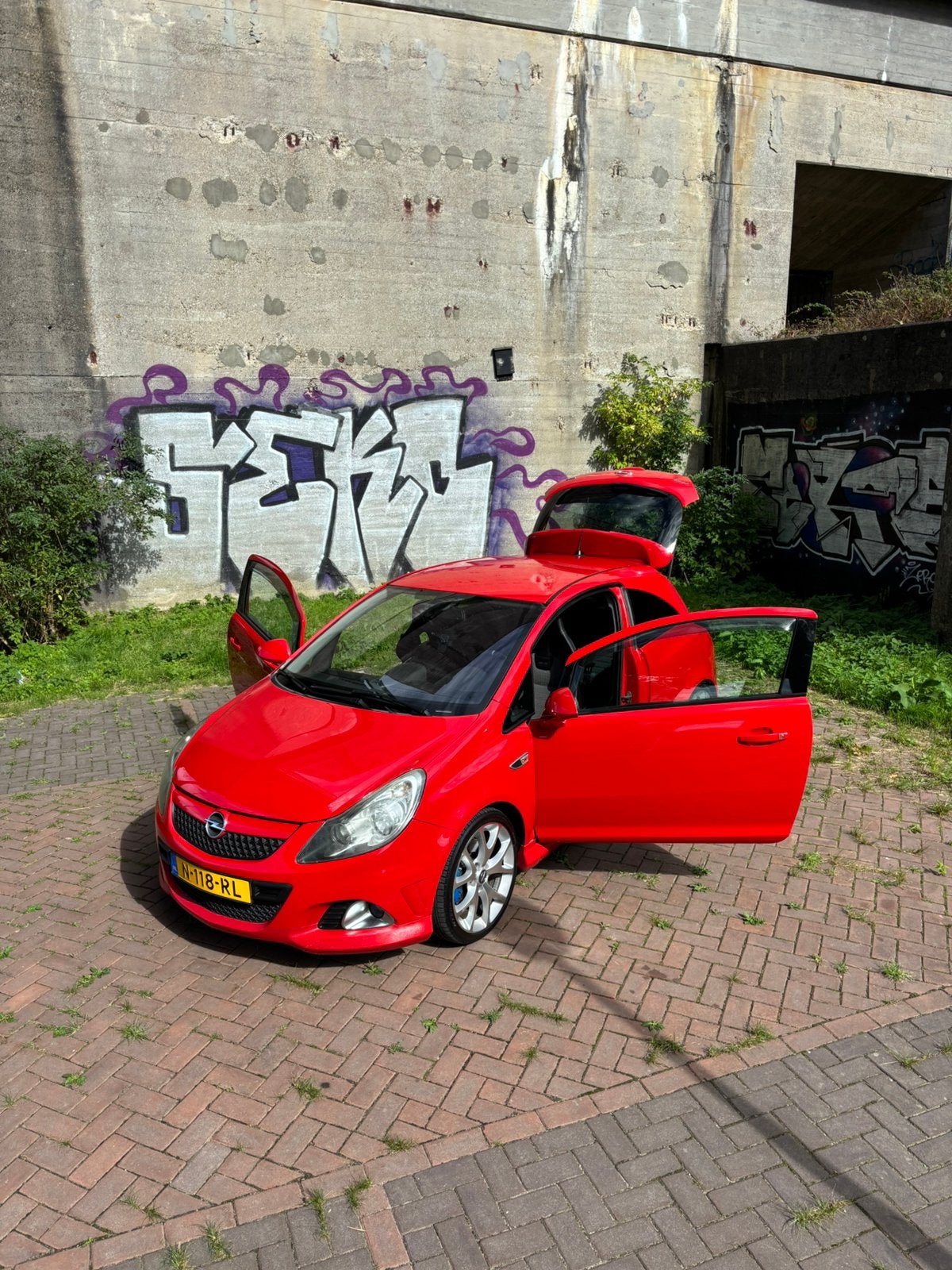 Opel Corsa 1.6 OPC 3D 2010 Rood, Voorwielaandrijving, Zwart, Leder en Stof, 14 km/l