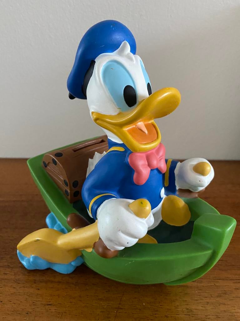 Donald Duck vintage spaarpot roeiboot, Verzamelen, Ophalen of Verzenden, Donald Duck, Gebruikt, Beeldje of Figuurtje