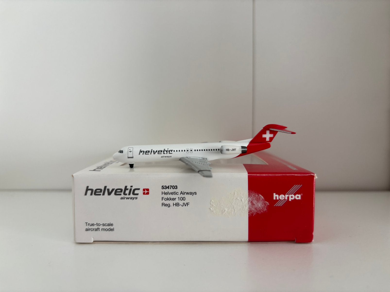 Herpa 534703 Helvetic Airways Fokker 100 1:500, Verzamelen, Ophalen of Verzenden, Zo goed als nieuw, Schaalmodel