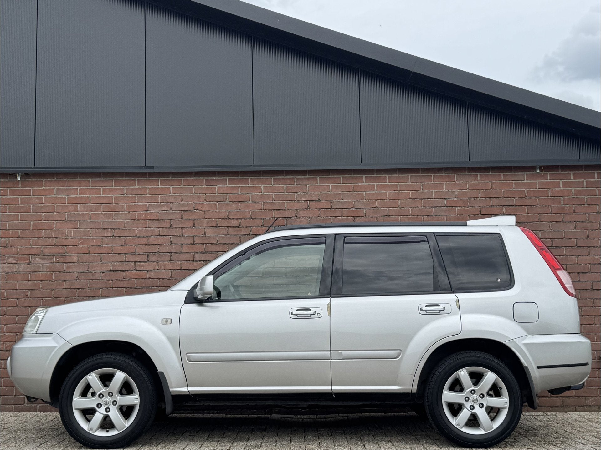 Nissan X-Trail 2.5 COLUMBIA STYLE | NL-AUTO! | TREKHAAK!, Auto's, Automaat, 1350 kg, Stof, Gebruikt