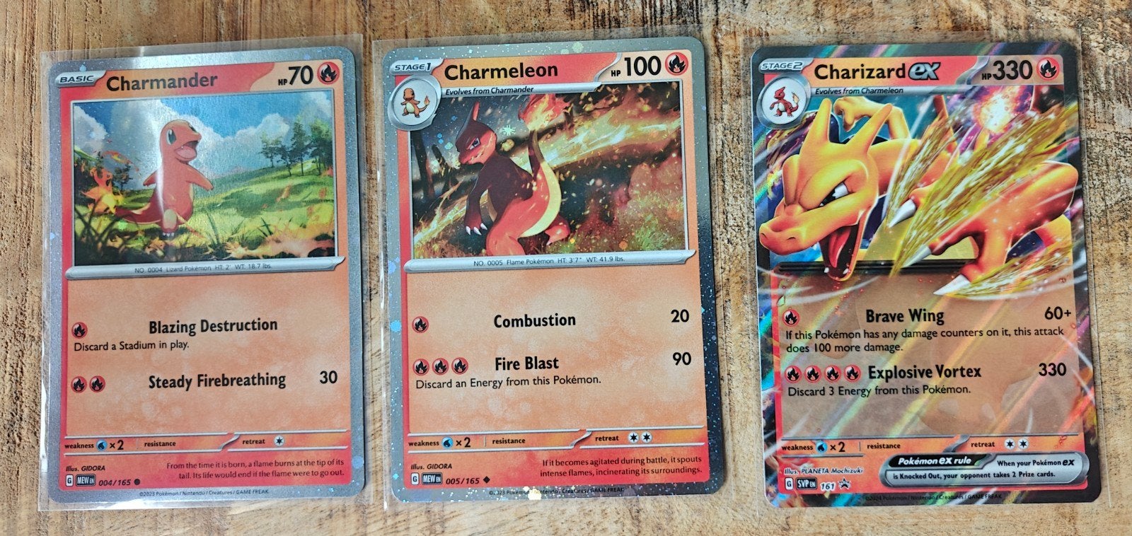 Pokémon Kaarten Set: Charmander, Charmeleon, Charizard ex, Ophalen of Verzenden, Zo goed als nieuw, Meerdere kaarten, Foil