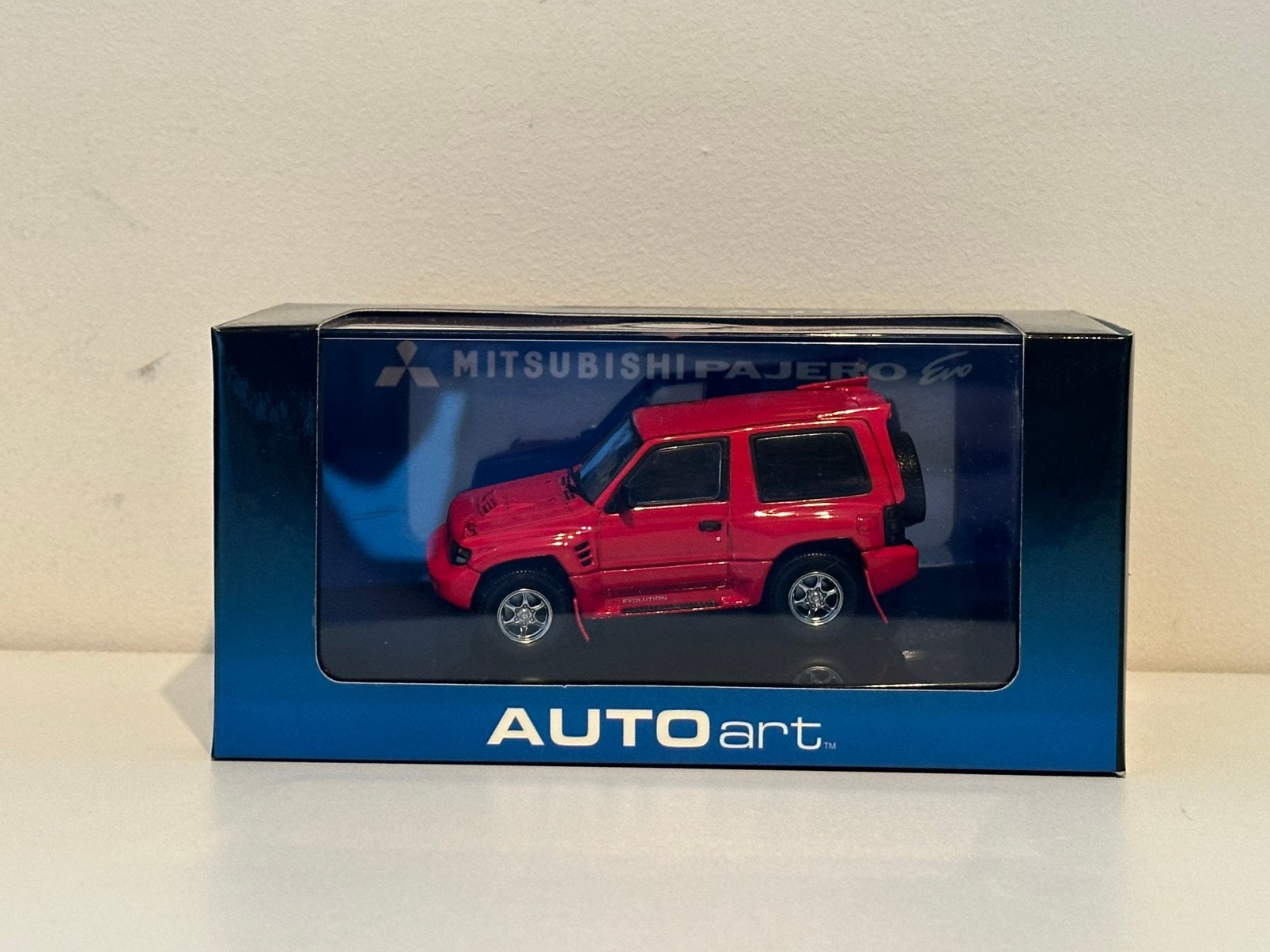 Mitsubishi Pajero Evo | AutoArt | schaal 1:43 | Nieuw, Ophalen of Verzenden, Zo goed als nieuw, Auto, Overige merken