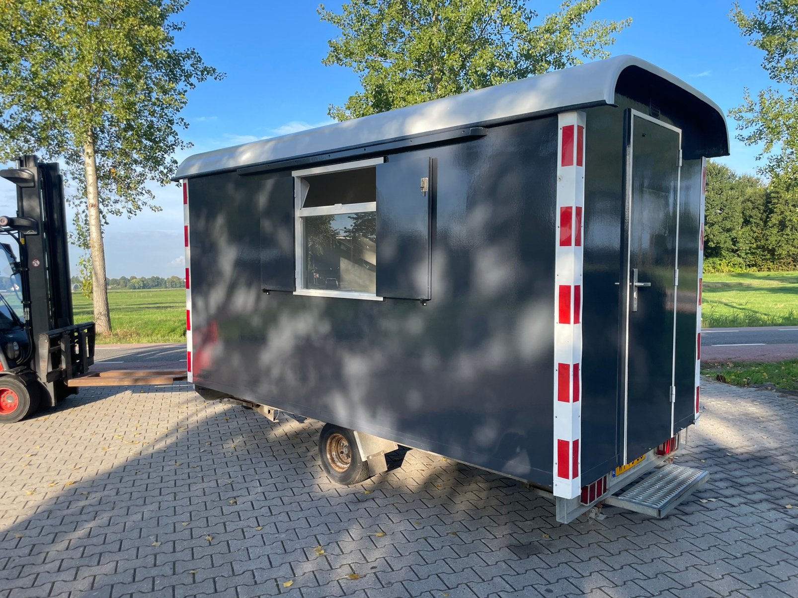 Polyester snelverkeer schaftwagen, Ophalen