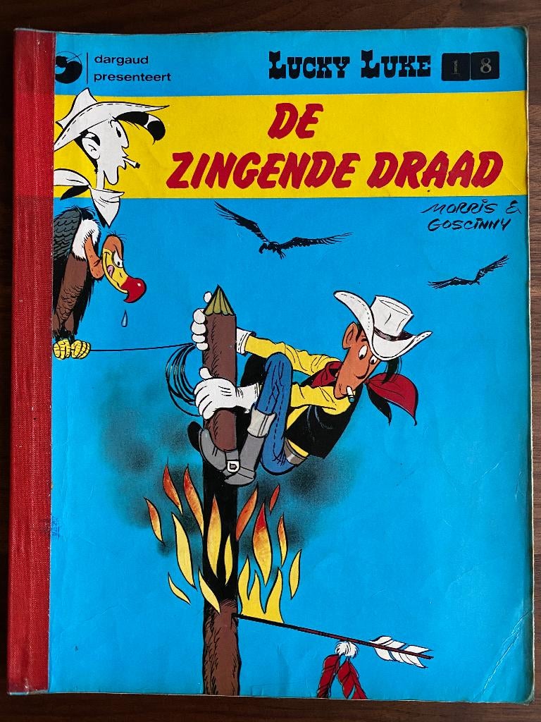 Lucky Luke - De Zingende Draad, Gelezen, Eén stripboek, Ophalen of Verzenden, Morris & Goscinny