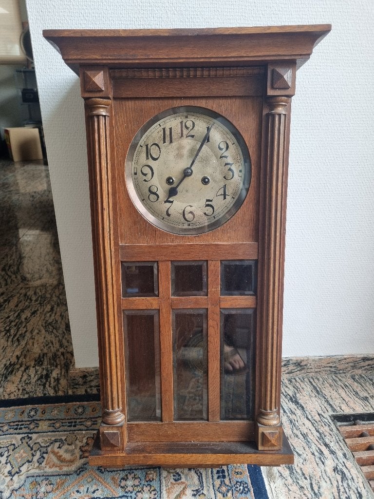 Junghans antieke wandklok, Ophalen