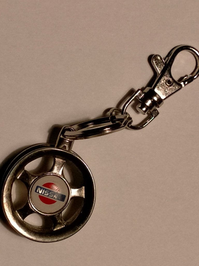 Nissan auto automobiel sleutelhanger wiel logo merk, Verzenden, Gebruikt, Auto's