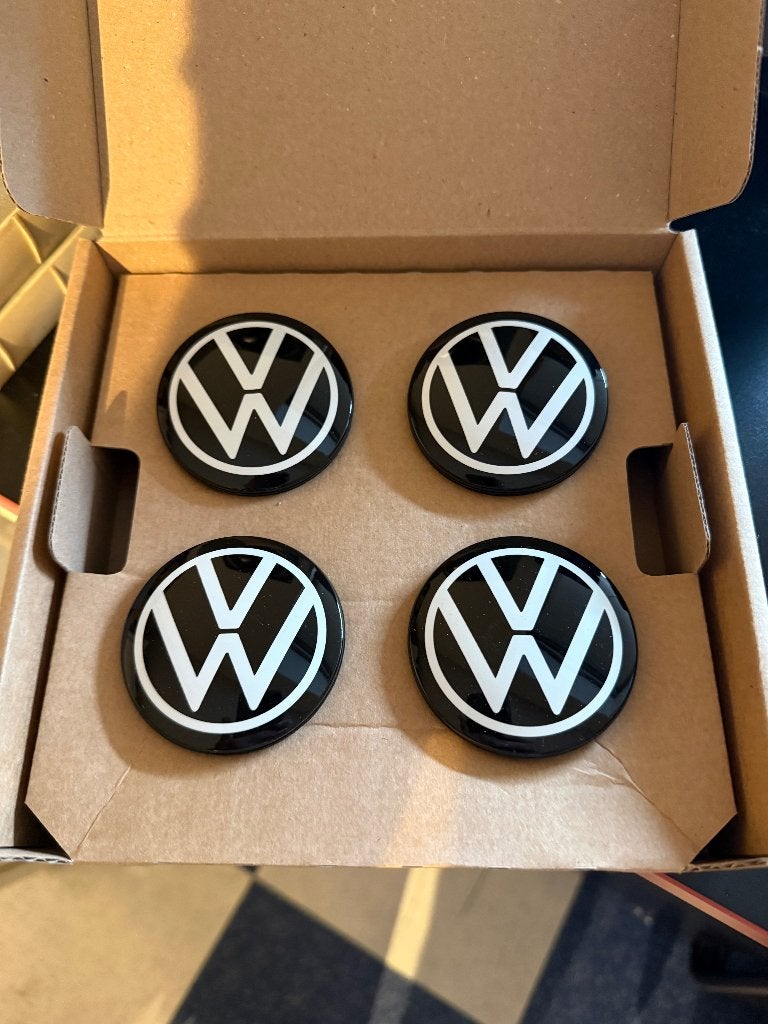 VW meedraaiende naafkappen nieuw in doosje, Ophalen of Verzenden, Nieuw