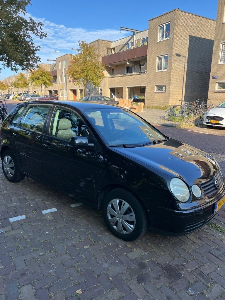 Volkswagen Polo 1.4 55KW 2005 Zwart Nieuwe APK/AIRCO, Voorwielaandrijving, 15 km/l, 4 cilinders, Zwart