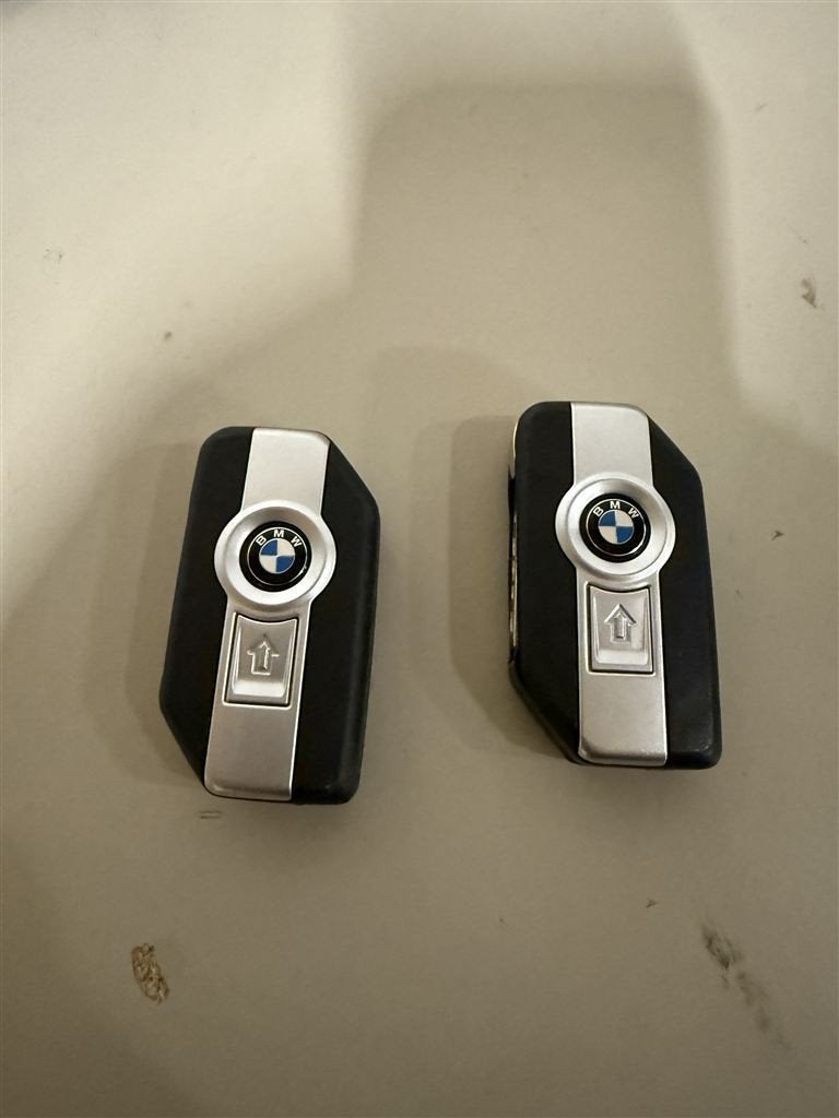 BMW vier klapsleutels - 2 missen batterij klepje, Ophalen of Verzenden, Zo goed als nieuw