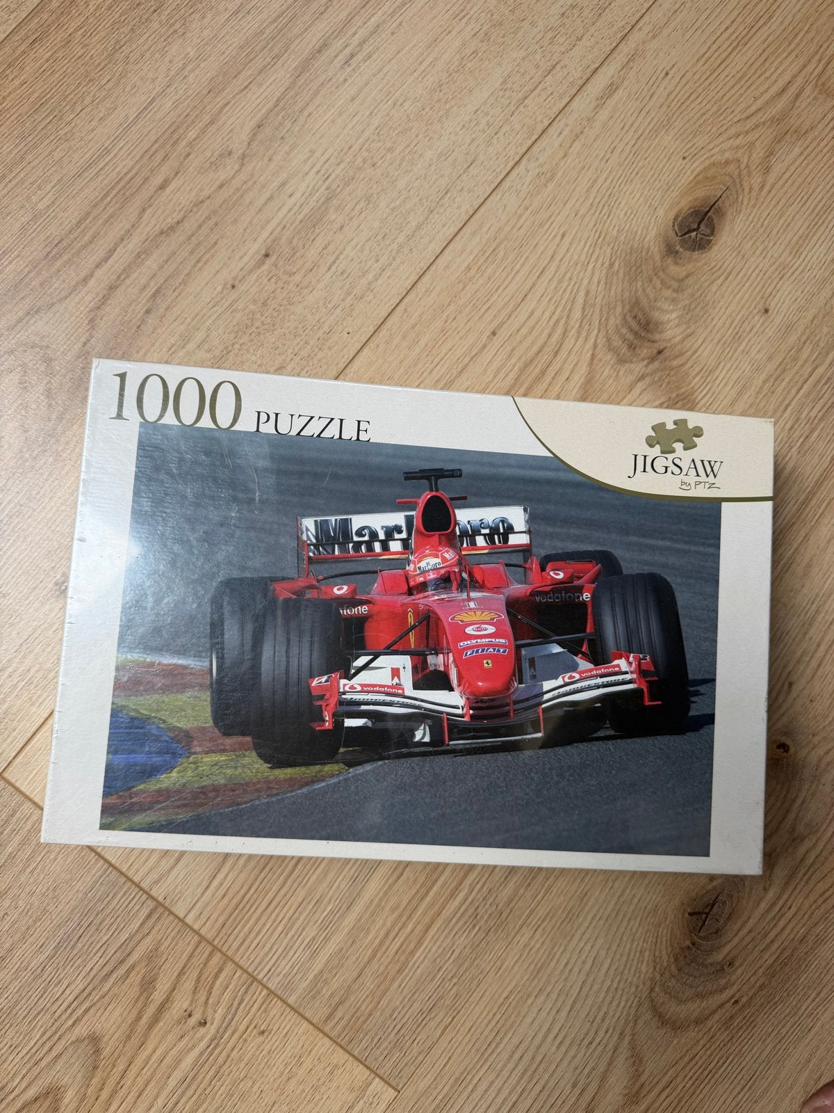 Puzzel Formule 1 Ferrari michael Schumacher 1000 stukjes, Ophalen of Verzenden, 500 t/m 1500 stukjes, Nieuw, Legpuzzel