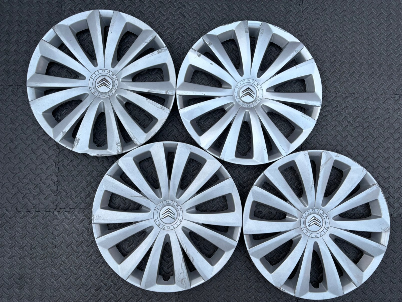 Set originele Citroen C3, C4 en Berlingo wieldoppen 16 inch, Ophalen of Verzenden, Gebruikt