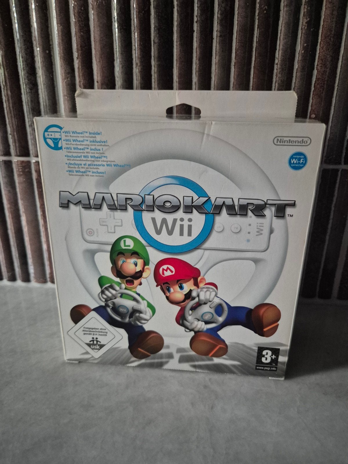 Mario Kart Wii met Wii Wheel - Compleet in doos, Racen en Vliegen, Ophalen of Verzenden, Zo goed als nieuw, 3 spelers of meer