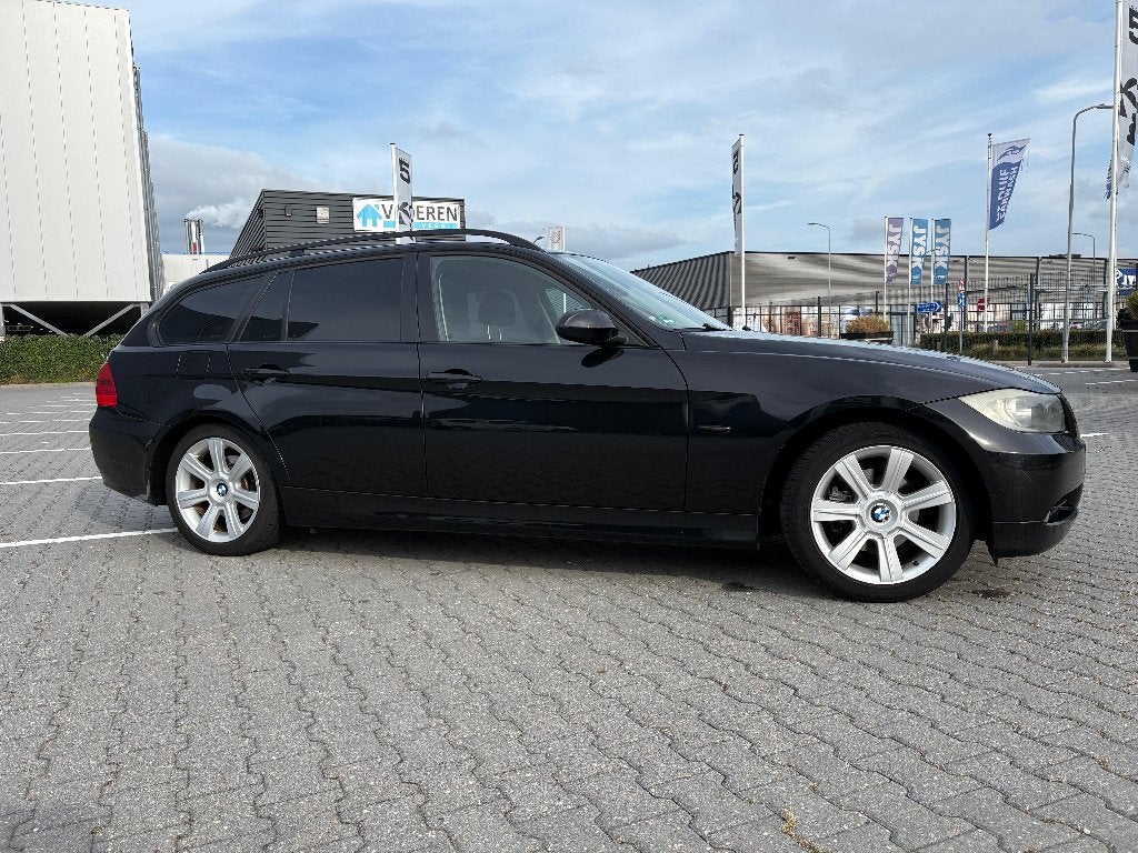 BMW 318i Touring E91 | High Executive | Ketting vervangen, 13 km/l, Achterwielaandrijving, Zwart, 4 cilinders