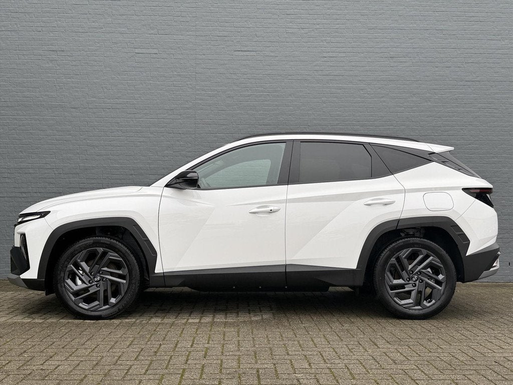 Hyundai Tucson 1.6 T-GDi PHEV 252pk Automaat | 20Th Annivers, Gebruikt, 4 cilinders, Wit, Bedrijf