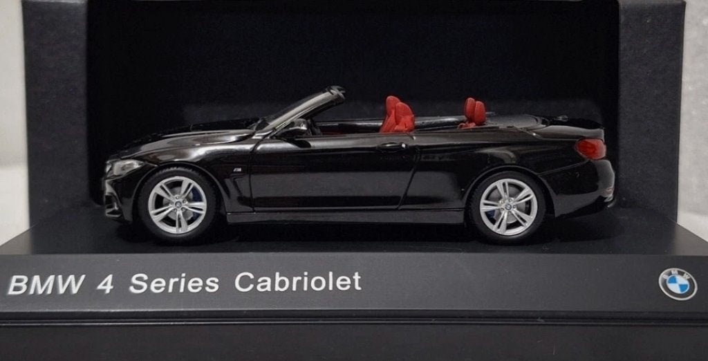BMW 4er convertible scale 1:43 black saphire zeldzaam 150,-, Hobby en Vrije tijd, Modelauto's | 1:43, Ophalen, Zo goed als nieuw