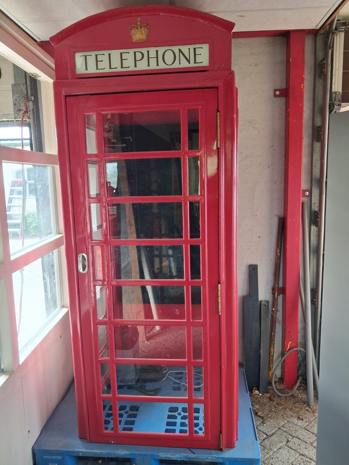Originele compleet gerestaureerde Engelse telefooncel, Ophalen
