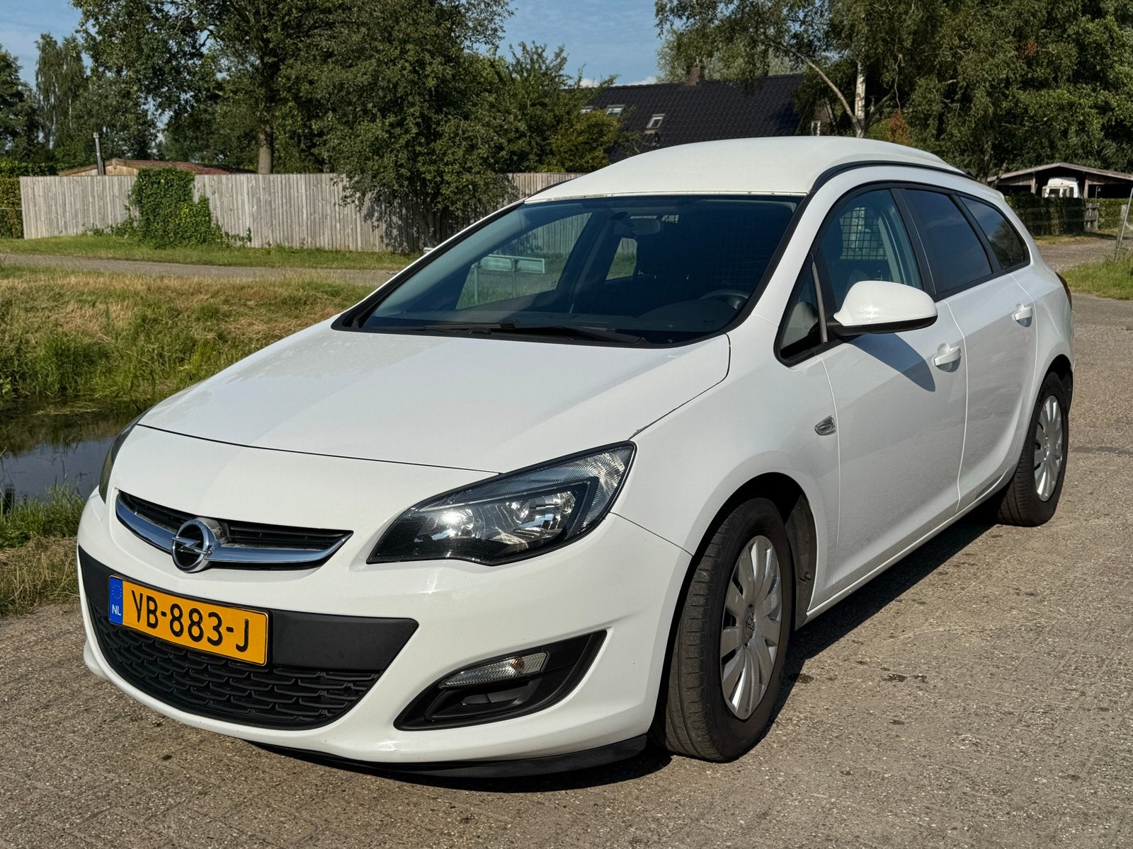 Opel Astra 1,25 L 95 PK Sports Tourer VAN 2013 184168 km, Auto's, Voorwielaandrijving, Euro 5, Wit, Origineel Nederlands