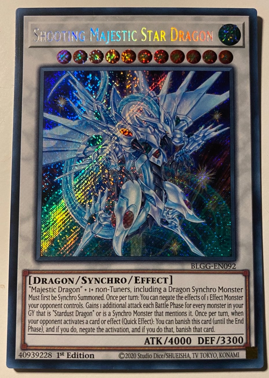 Yu-Gi-Oh! Shooting Majestic Star Dragon BLGG 1st Edition !, Ophalen of Verzenden, Zo goed als nieuw, Losse kaart, Foil