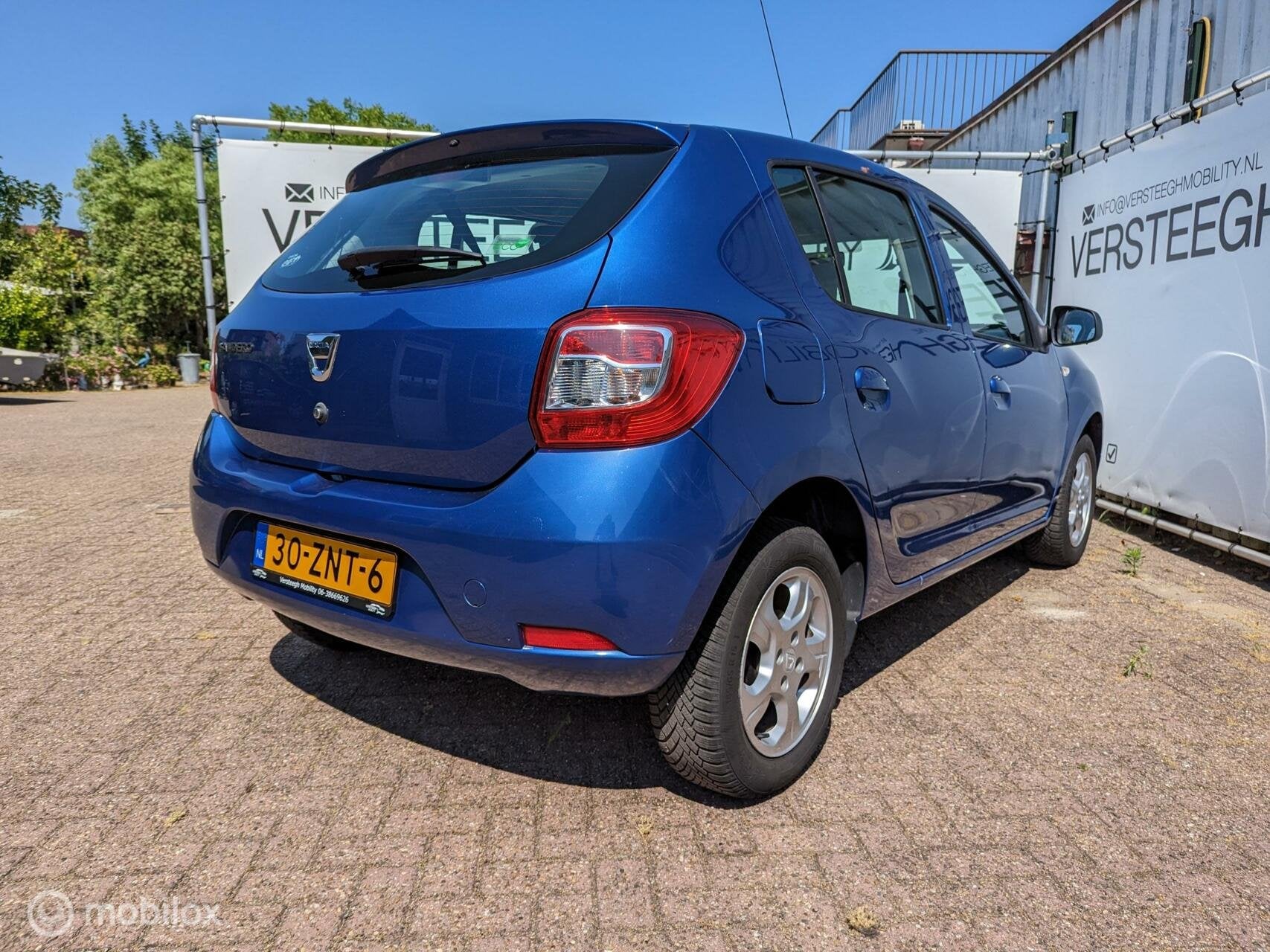 Dacia Sandero 0.9 TCe Lauréate, Navigatie, Airco, Cruise, Auto's, Voorwielaandrijving, Gebruikt, 937 kg, Met garantie (alle)