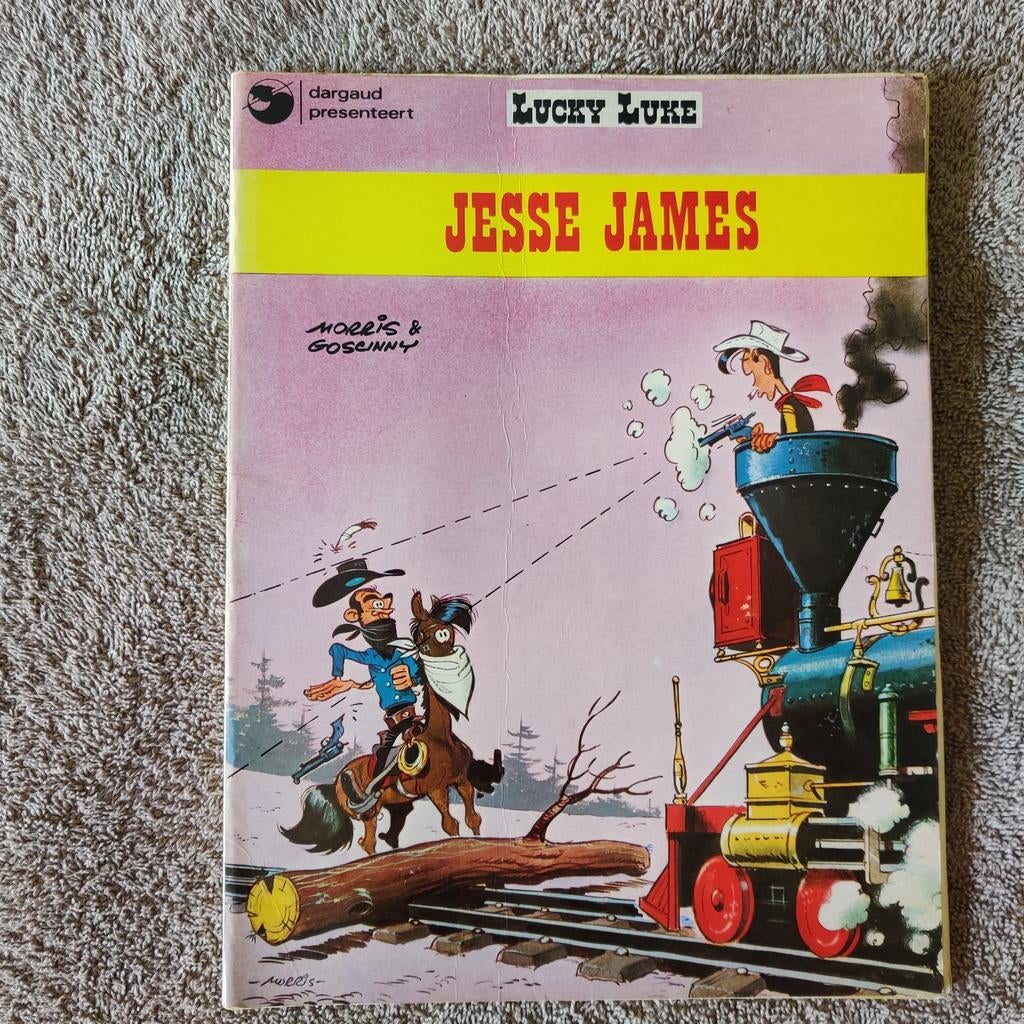 Lucky Luke - Jesse James (bladzijdes laten los), Eén stripboek, Ophalen of Verzenden, Gelezen, Morris & Goscinny